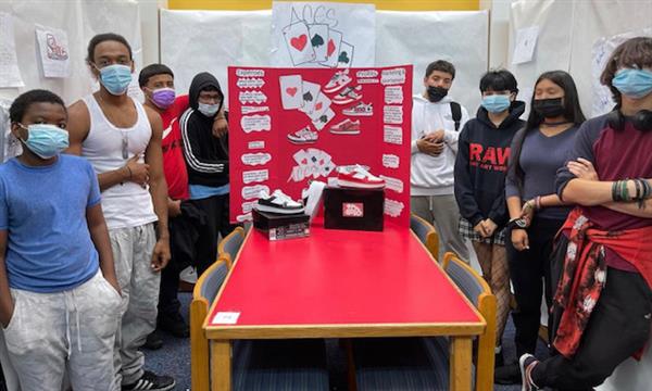 Allau, Andre, Xavier, Joshua, Daniel, Sophie, Roxanna, and Charles with “ACES” a sneaker line business.