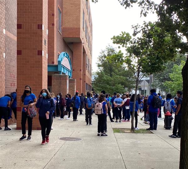 Prior to the start of school, students from the Browne Middle School gathered outside.