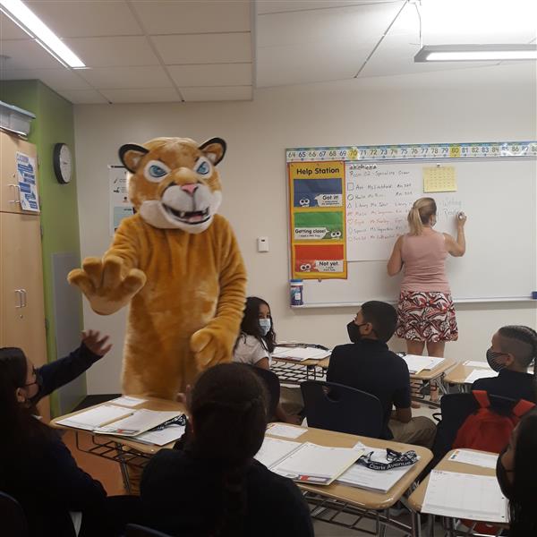 Cam the Cougar met with students in classrooms on the first day of school at the Clark Middle School.
