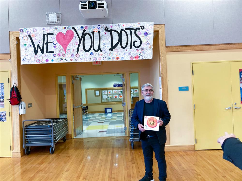 Early Learning Center students and teachers designed signage to present to the Reynolds brothers based on their own stories and illustrations.