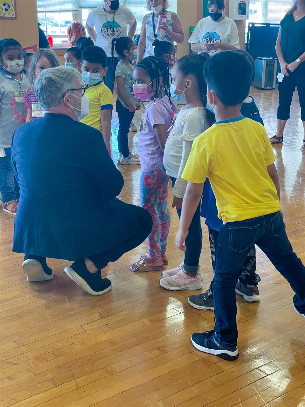 Peter Reynolds spoke with students following his presentation to them at the Early Learning Center.