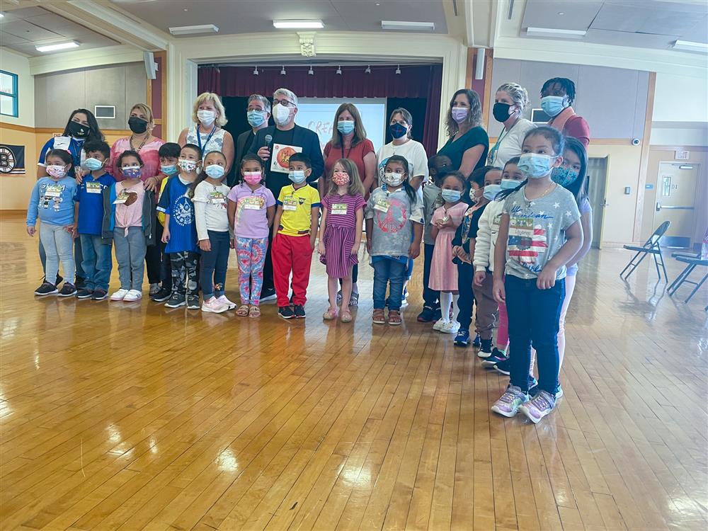 Students and staff from Chelsea Public Schools and the Early Learning Center posed for pictures with the Reynolds brothers.
