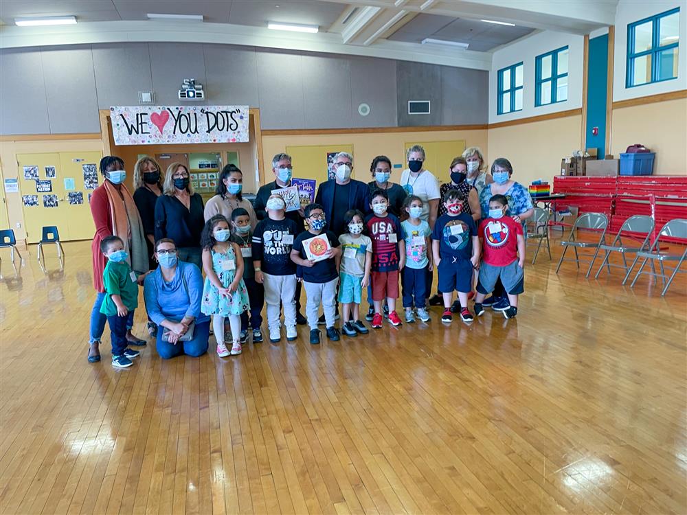 Students and staff from Chelsea Public Schools and the Early Learning Center posed for pictures with the Reynolds Brothers.