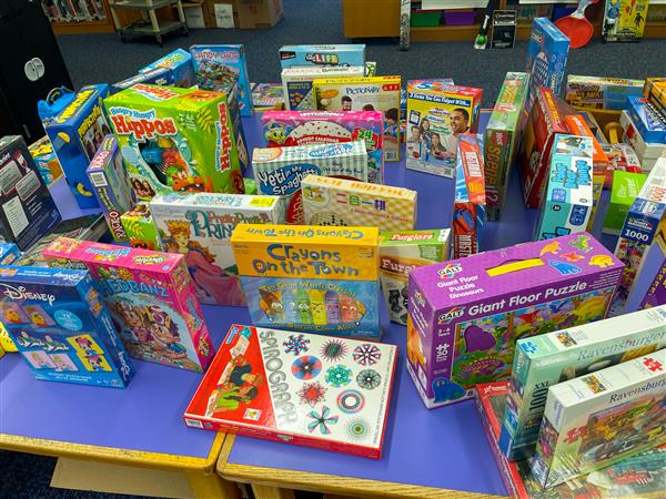 Toys available to parents and families at the Holiday Shop including board games like these!